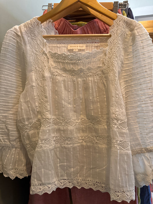 Blusa tira bordada Olanes